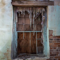 Tattered church window